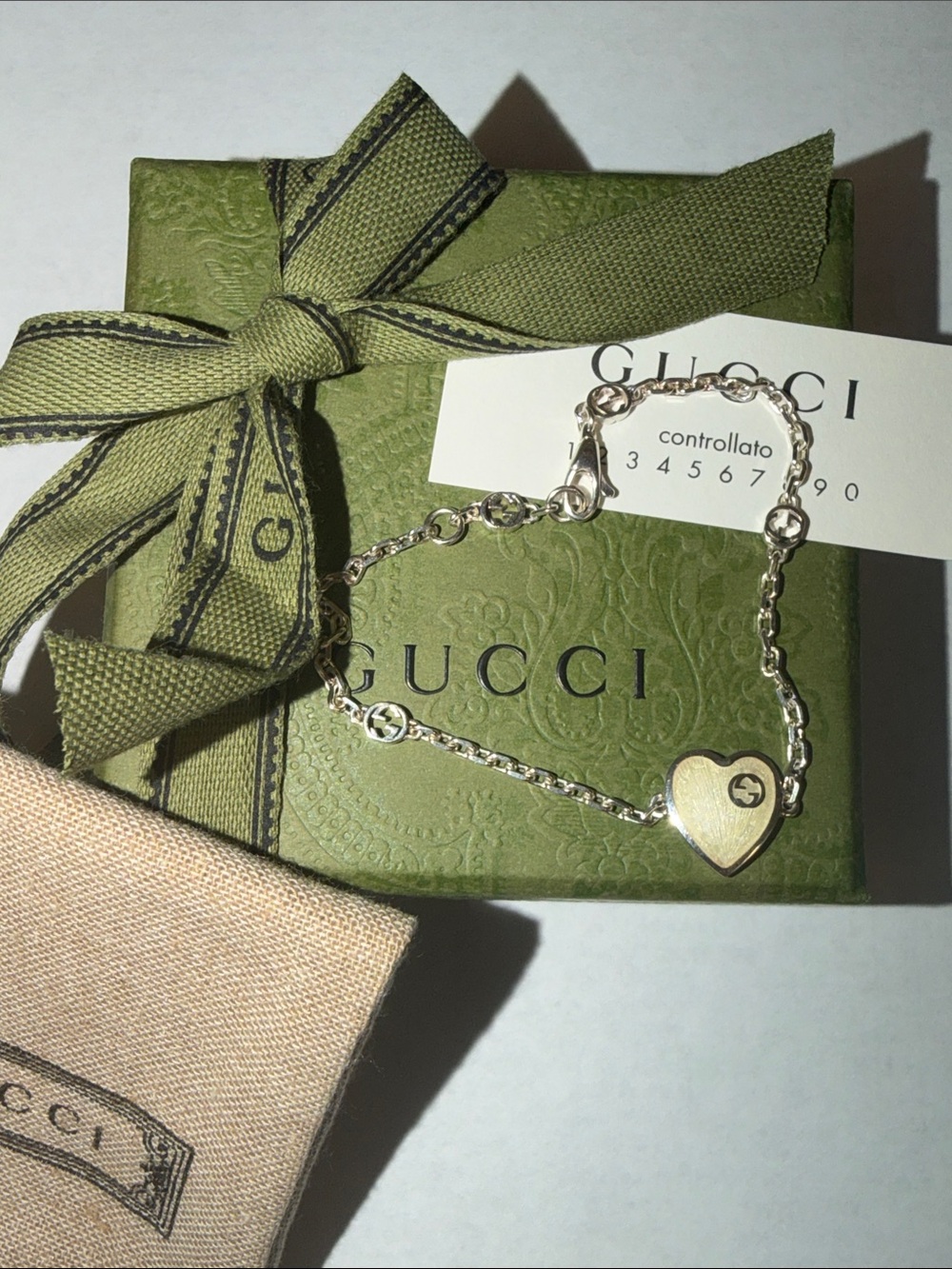 Gucci Interlocking White Enamel Sterling Silver Heart Pendant Bracelet